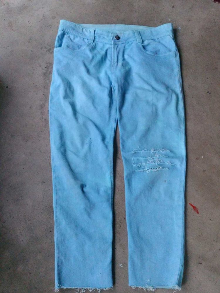 Distressed Light Blue Jeans