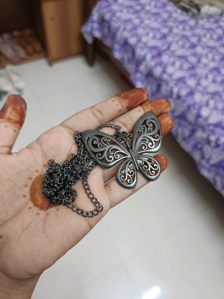 classic butterfly oxidized locket.