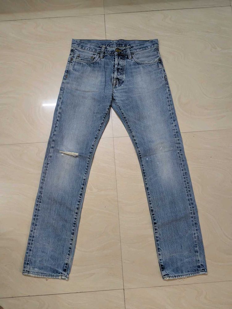 Worn Blue Denim Jeans