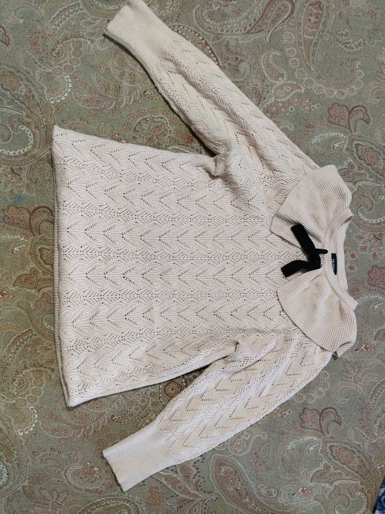 Elegant Knit Sweater with Bow Detail