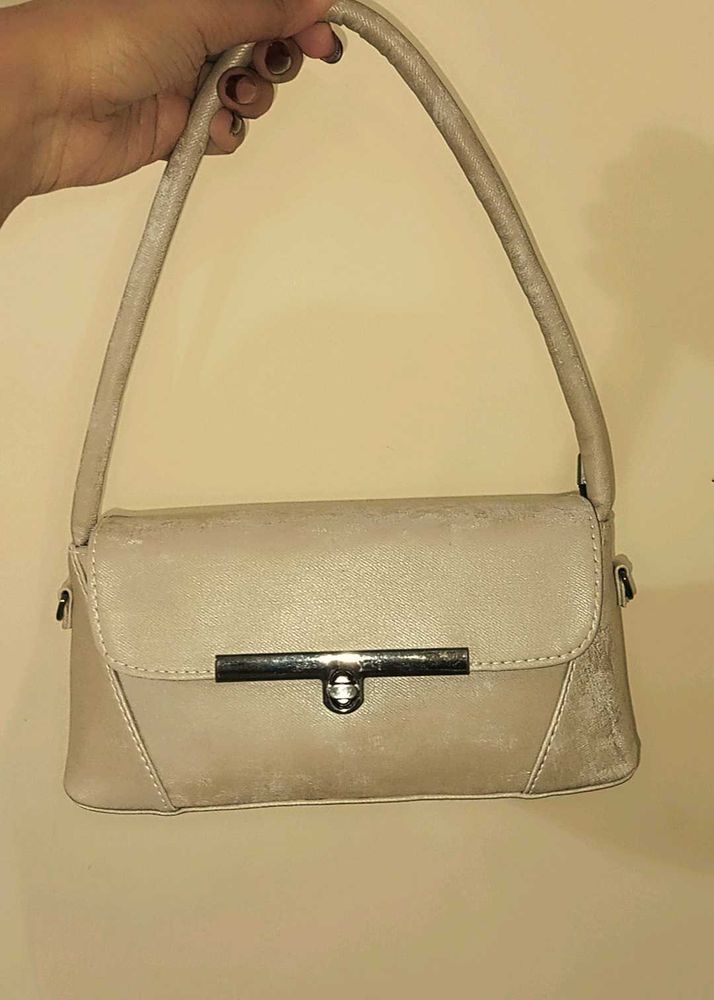 beige baguette bag