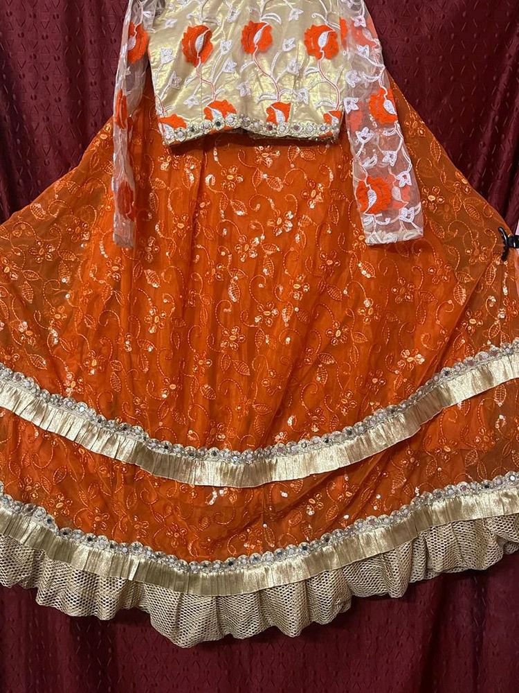 Golden Orange Lehnga Choli