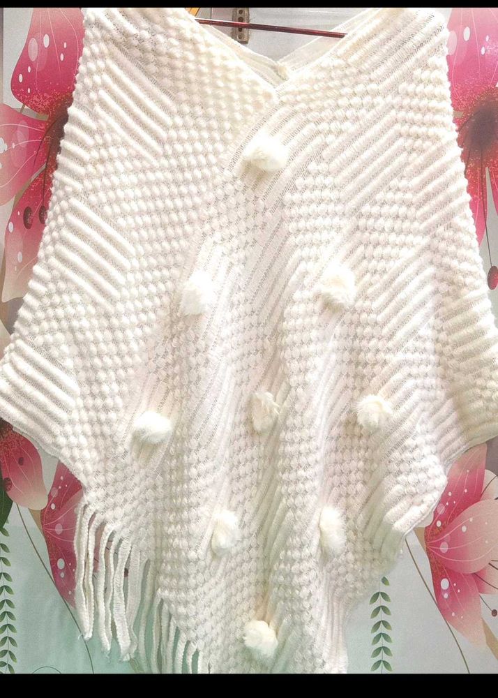 Cozy Knit Poncho with Pom Poms