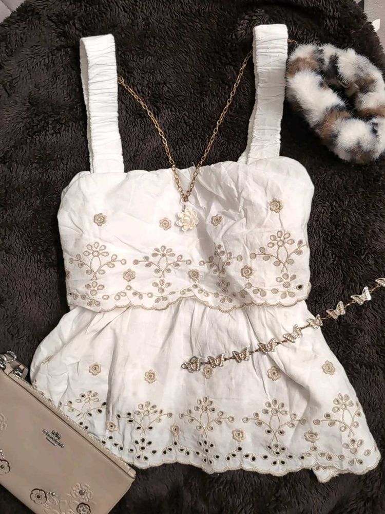 White Embroidered Peplum Top