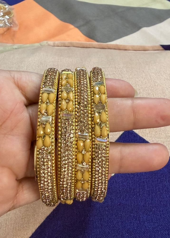 A Set Of 4 Bangles