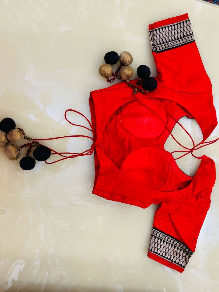Red Blouse with Embellishments