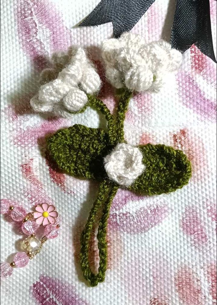 lily of the valley and tulip purse charm.