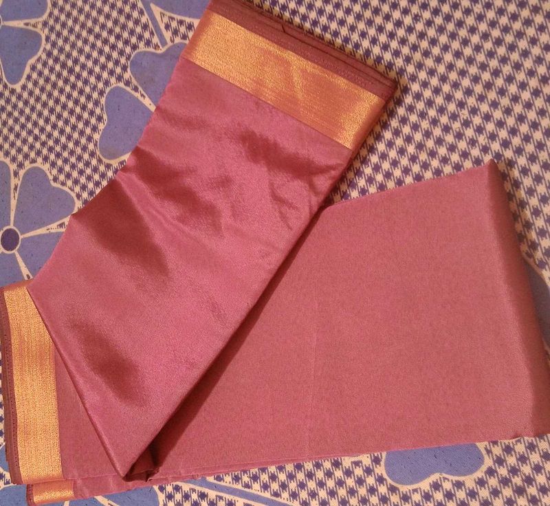 Elegant Mauve Saree With blouse Piece.
