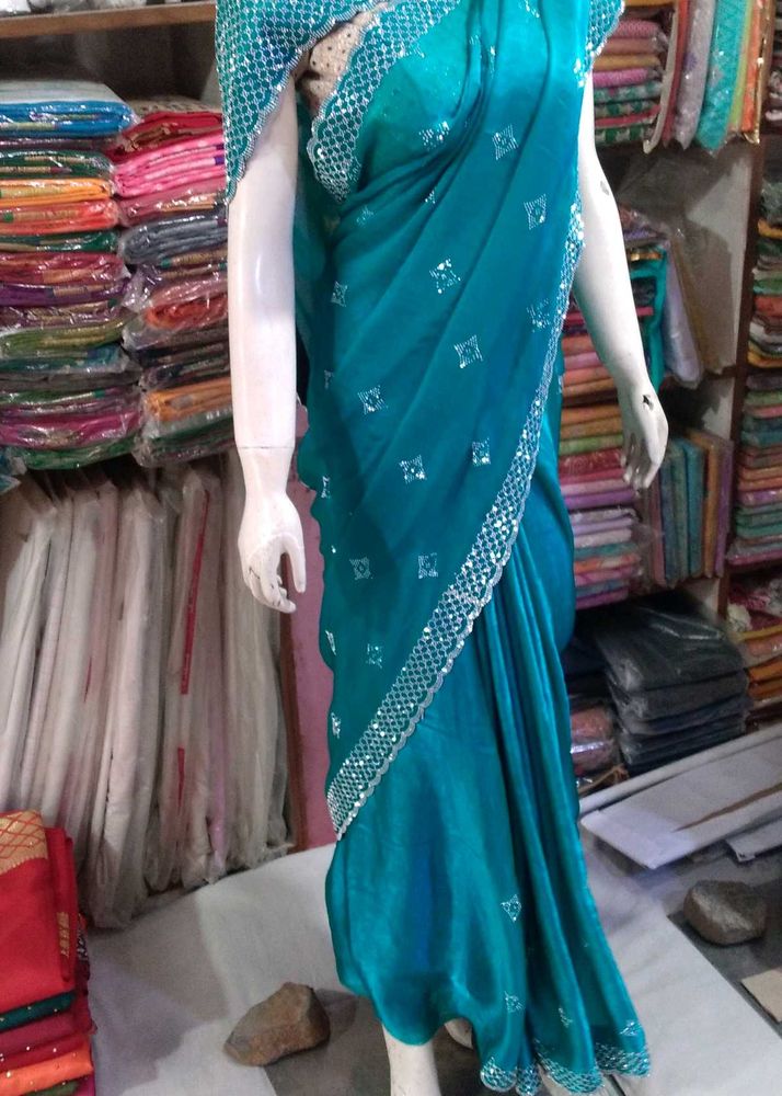 Teal Saree with Silver Embellishments