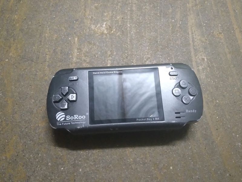 Pvp Video Game Handled Console.                   Wants Only Charger Still Works