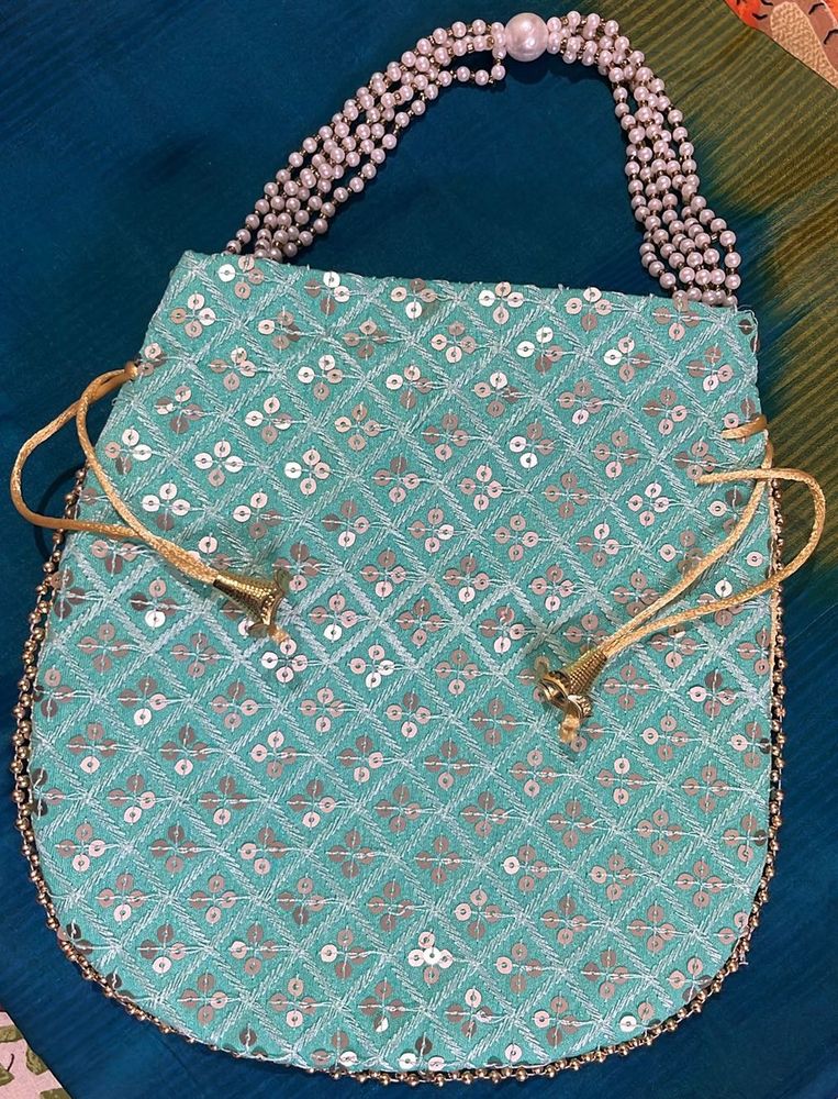 Complete Your Traditional Look With This Bag!!