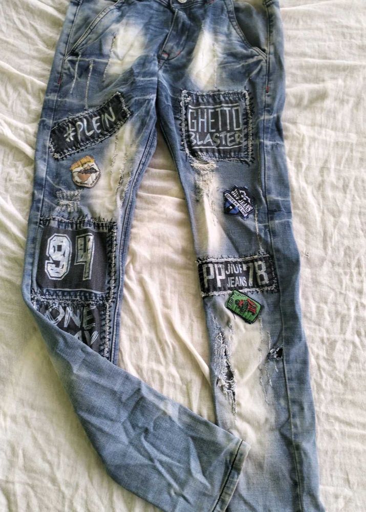 Distressed Graphic Patch Jeans
