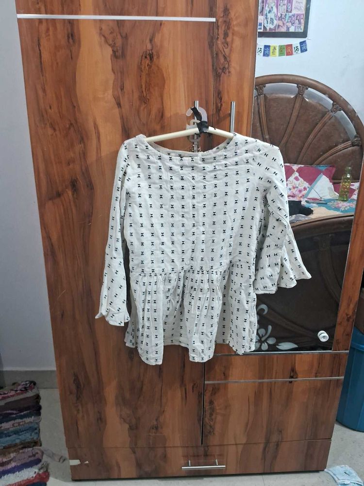 Patterned Peplum Top