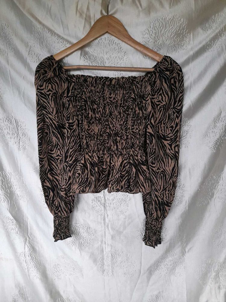 Zebra Print Smocked Blouse