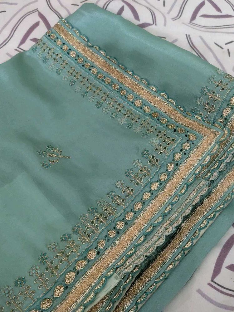 Sea Green Saree with Delicate Lace