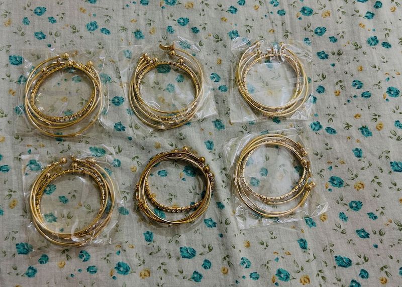 6 Sets of golden Bracelets