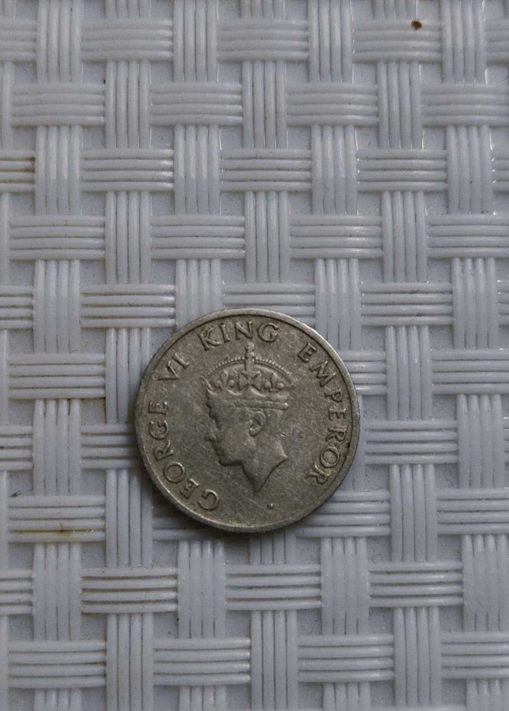 A 1946 British India quarter rupee coin