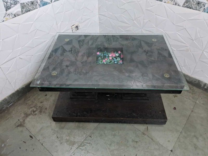 Glass Top Coffee Table with Floral Accent