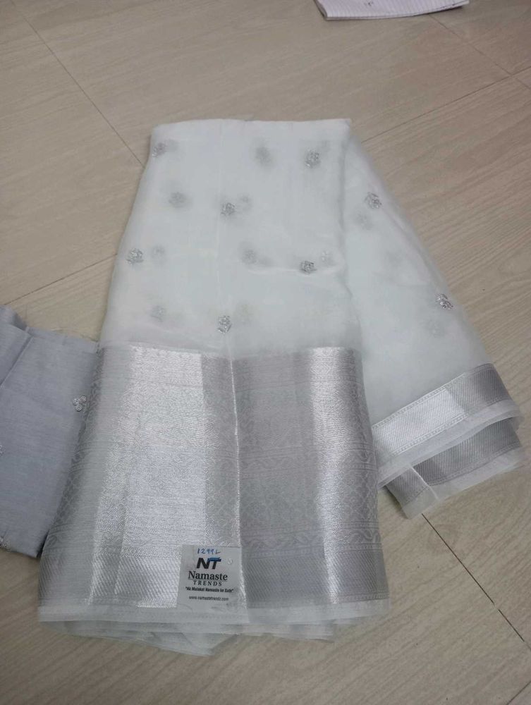 Elegant Sky White Saree Orgenza