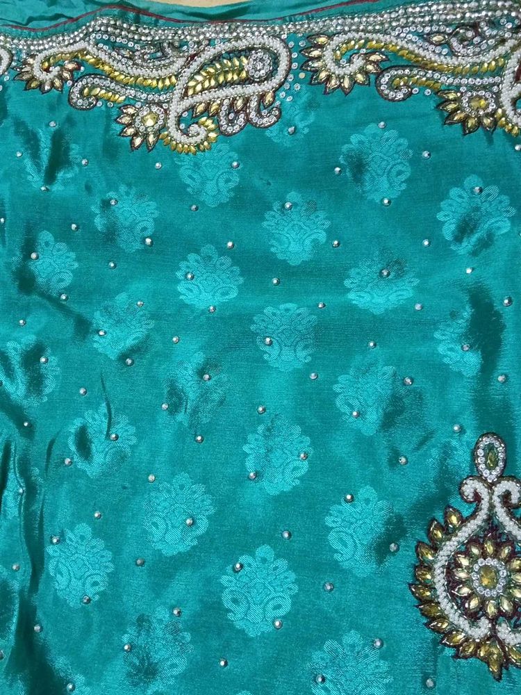 Elegant Teal Embellished Saree