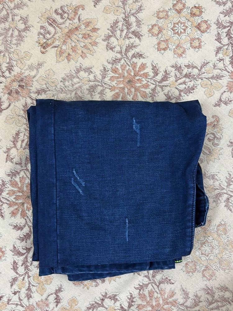 Distressed Denim Jeans