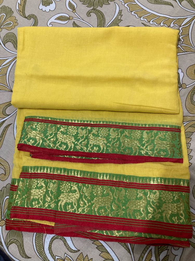 Yellow Traditional Saree with Green Border