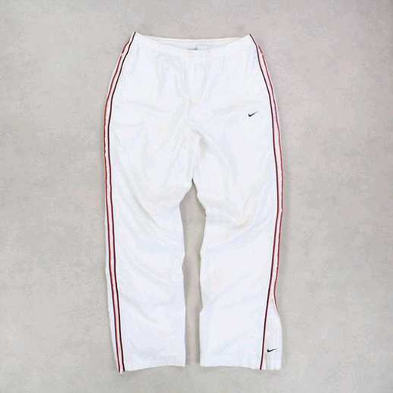 NIKE PARACHUTE BAGGY TRACKS.