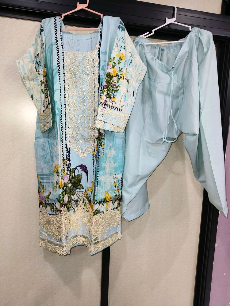 SKY BLUE PAKISTANI HEAVY PATCH WORK DRESS.
