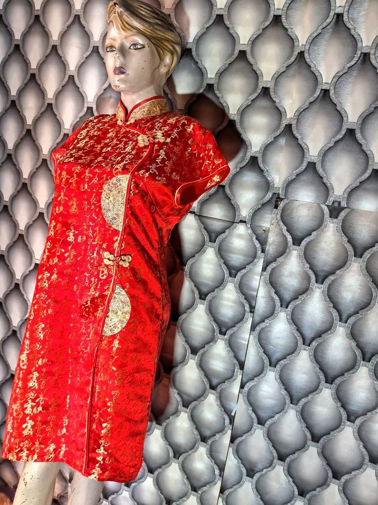 Cheongsam With Golden Thread Work On It
