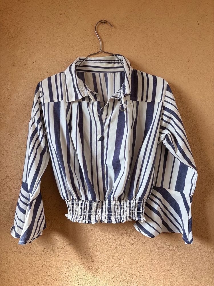 White Top With The Blue Strips On It
