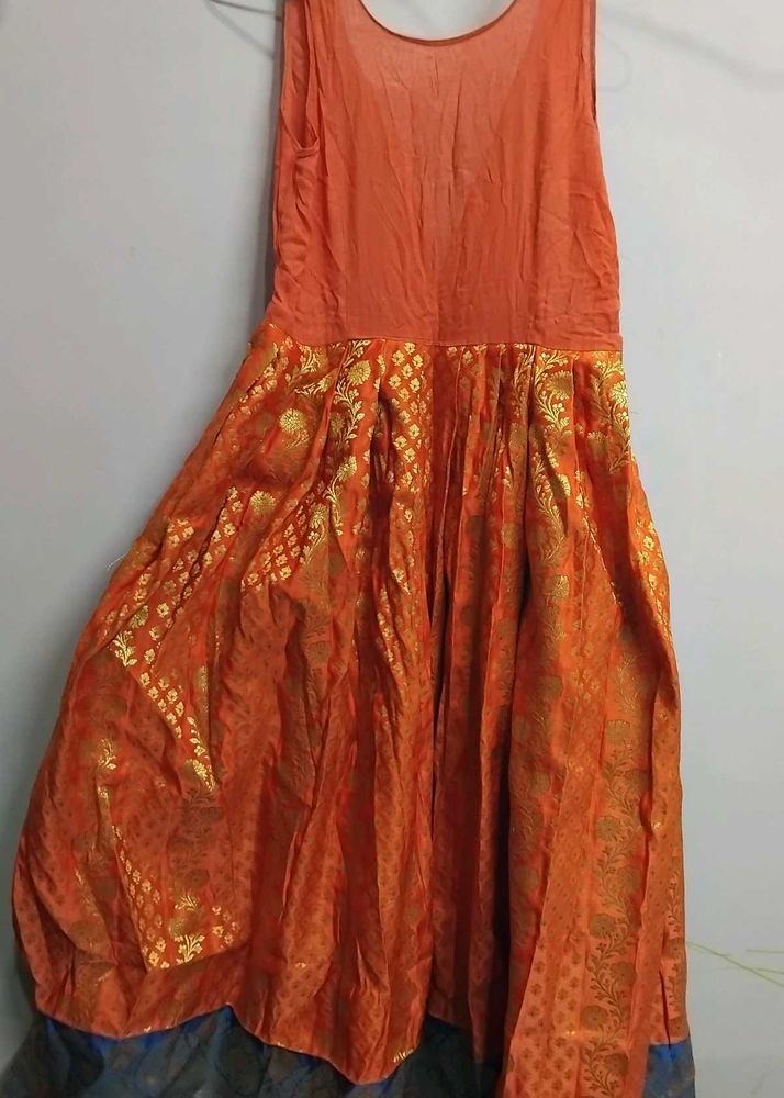 Orange &amp; Gold Lehenga Choli with Maggam work