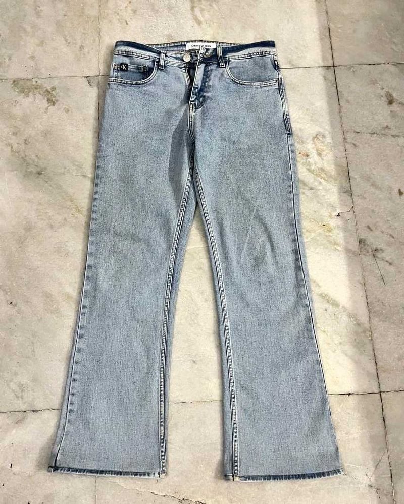 CALVIN KLIEN ICE WASHED BLUE BOOTCUT JEANS 32