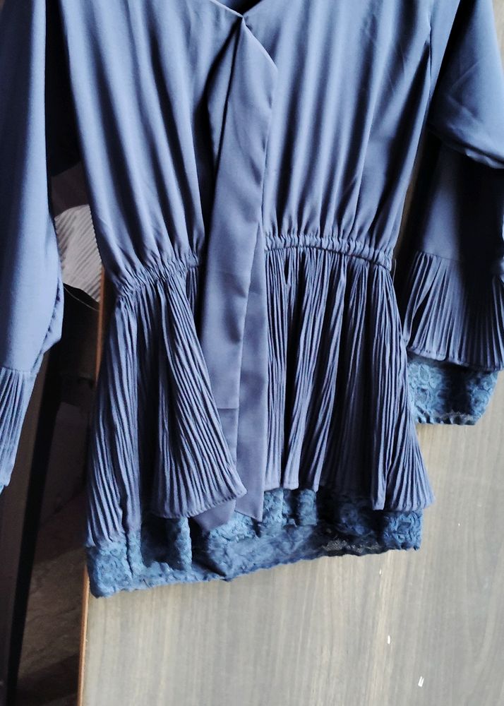 It Is A Very Good Looking Blue Colour Top And S