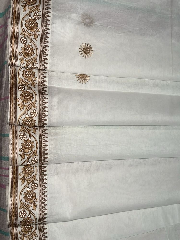 Brown Floral Bordered White Saree