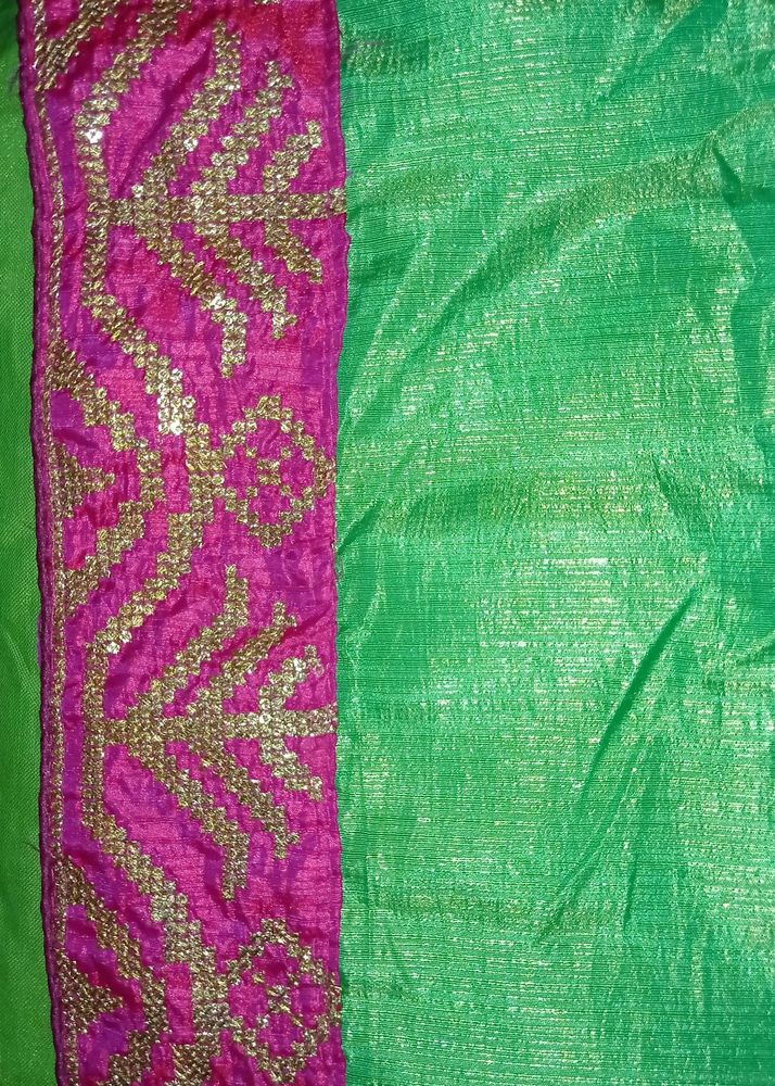 Parrot green saree with boat neck pink blouse