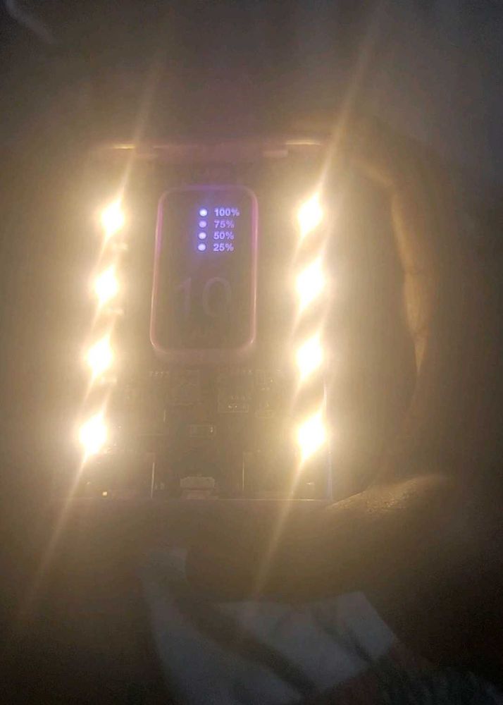 MI powerbank and inside in emergency light