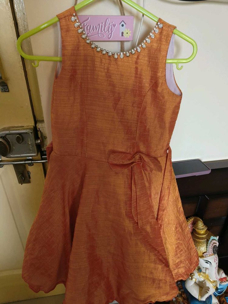 Girl&#39;s Orange Dress with Embellishments