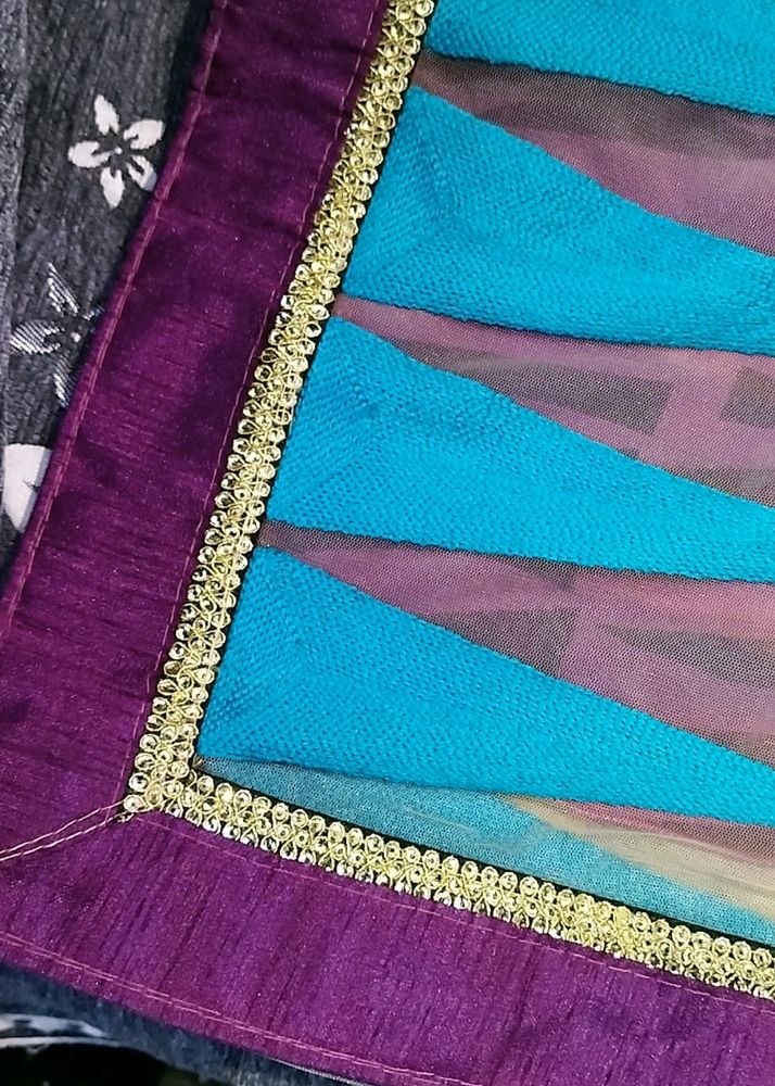 Saree In Multi Colour With Golden Lace.