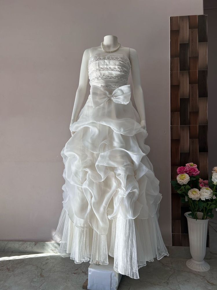 VOLUMINOUS RUFFLED ORGANZA WEDDING GOWN