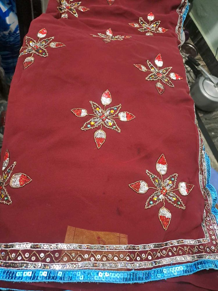 Elegant Maroon Embellished Saree
