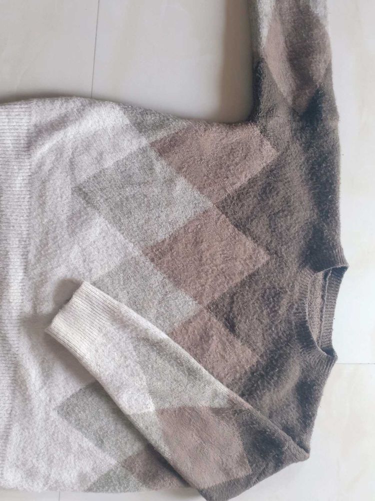 A Cropped Sweater Of Fabric Wool