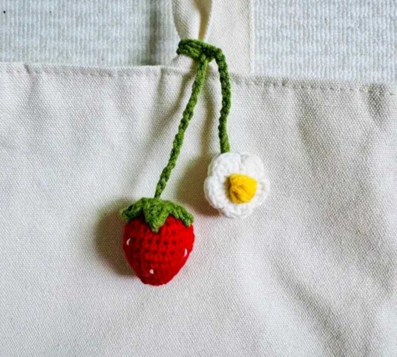 Crochet strawberry and flower charm