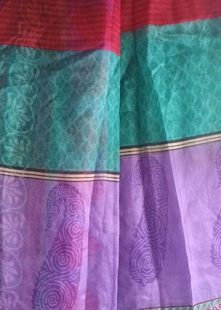 Red, Purple And Green Net Saree.