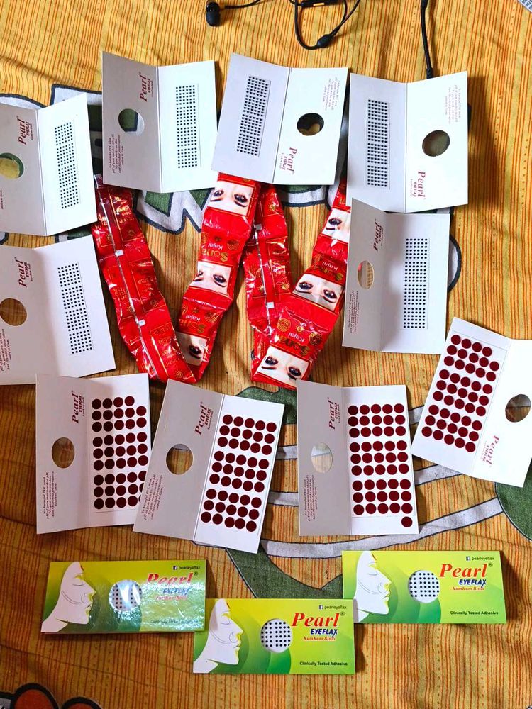 13 bindi sets and 12 kajal set