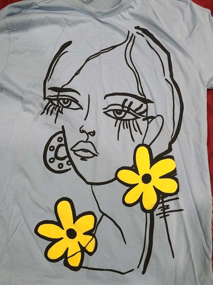 Graphic Tee with Floral Detail