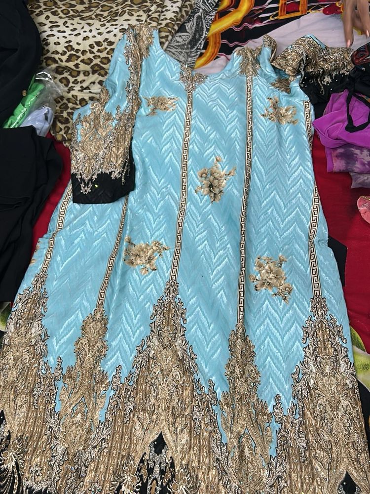 Brasso Suit With Black Salwar And Net Dupatta