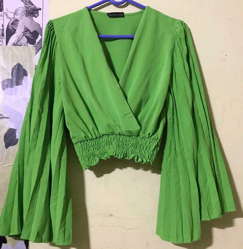 Bright green crop top.