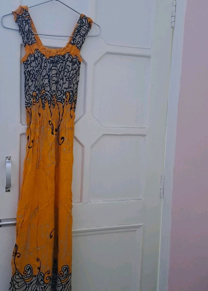 It Is A Pure Cotton Smocking Detailed Dress.Bought It Originally From Indonesia During A Trip There.It Is Unused.