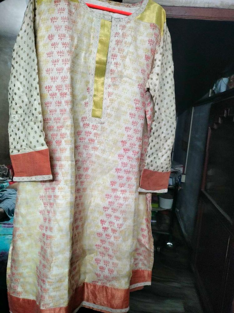 Cream Printed Nice Kurti.