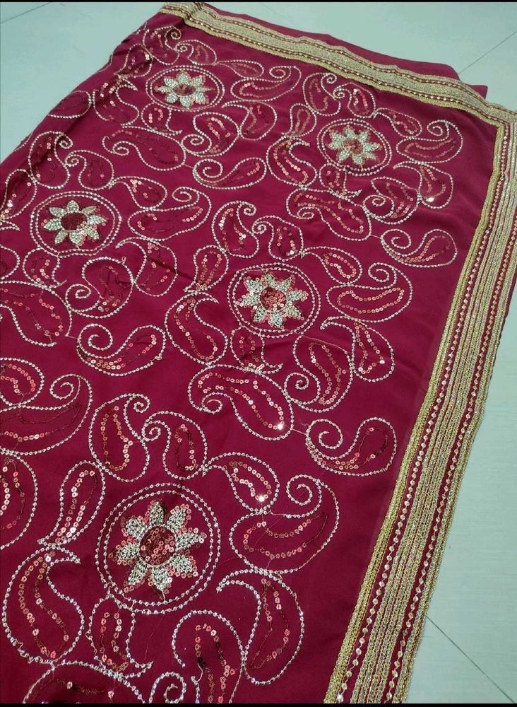 Elegant Maroon Embroidered Saree